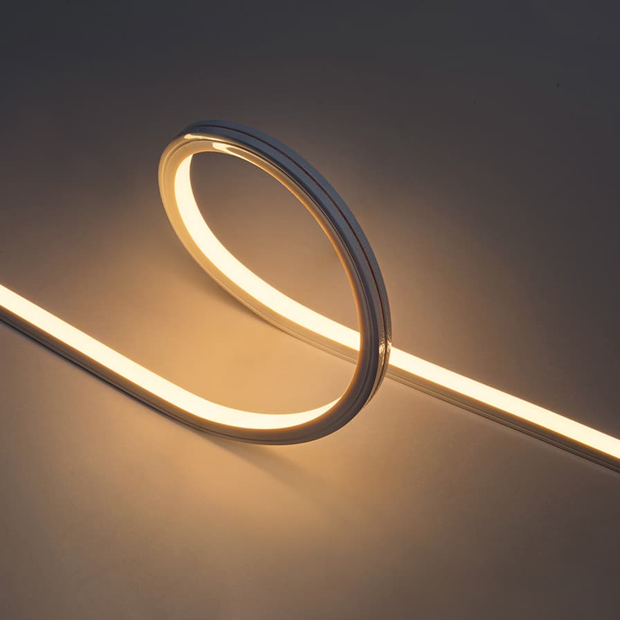 Glowing warm-white neon LED strip, coiled.